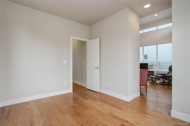 spare room featuring light hardwood / wood-style floors