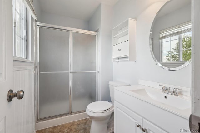 7598 Jared Way, Littleton, CO 80125 - bathroom with toilet, a stall shower, and vanity