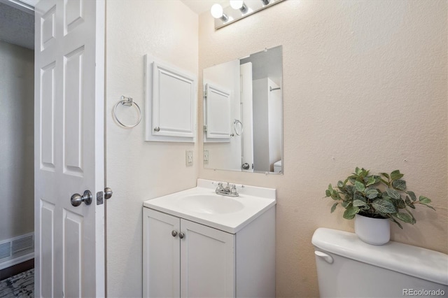 7598 Jared Way, Littleton, CO 80125 - half bath featuring toilet and vanity