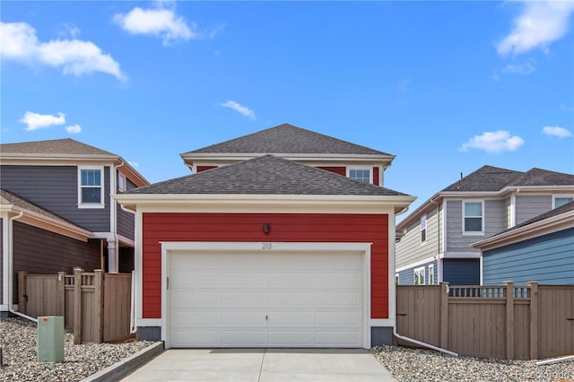 213 Washington St, Erie, CO 80516 - traditional-style home featuring concrete driveway, fence, and roof with shingles