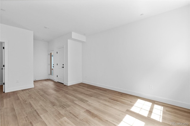 213 Washington St, Erie, CO 80516 - unfurnished room featuring light wood-style flooring and baseboards