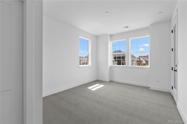 213 Washington St, Erie, CO 80516 - carpeted empty room with baseboards