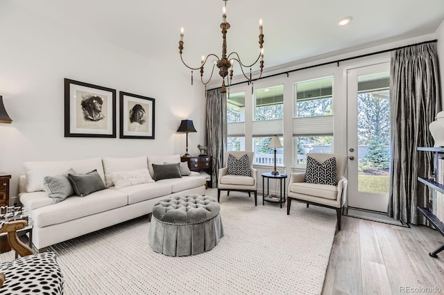 15919 Xanthia Way, Thornton, CO 80602 - living area featuring light wood-type flooring, a chandelier, and recessed lighting