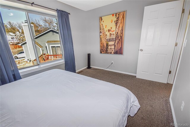 18971 E Mercer Dr, Aurora, CO 80013 - carpeted bedroom with baseboards