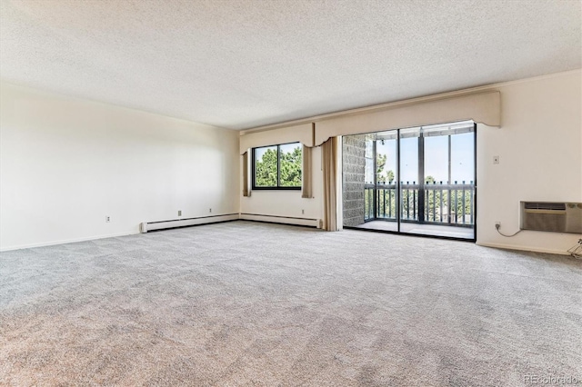 carpeted empty room featuring a textured ceiling, a wall mounted AC, and a baseboard radiator