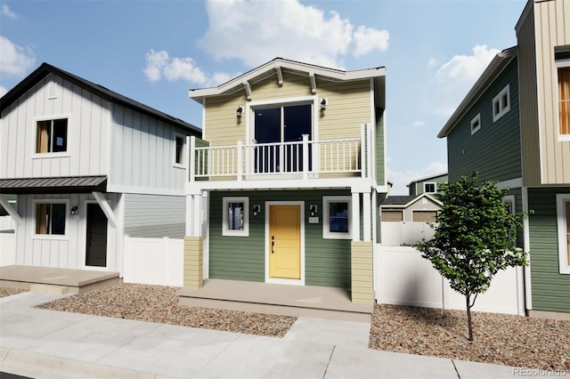 view of front of property with a balcony