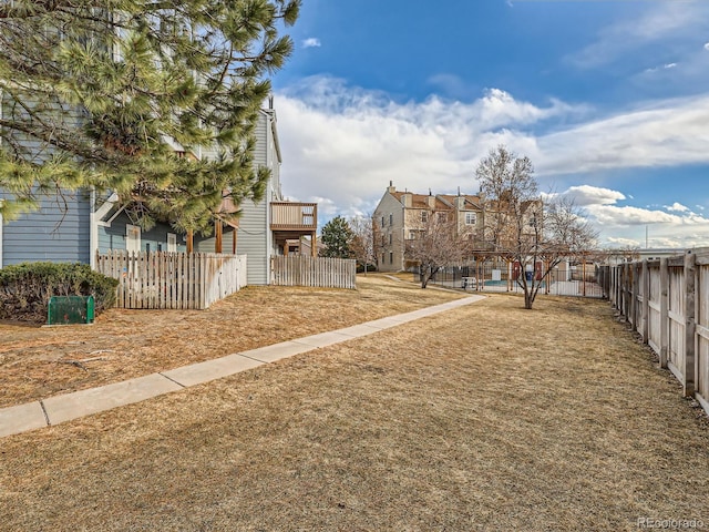 view of yard with fence