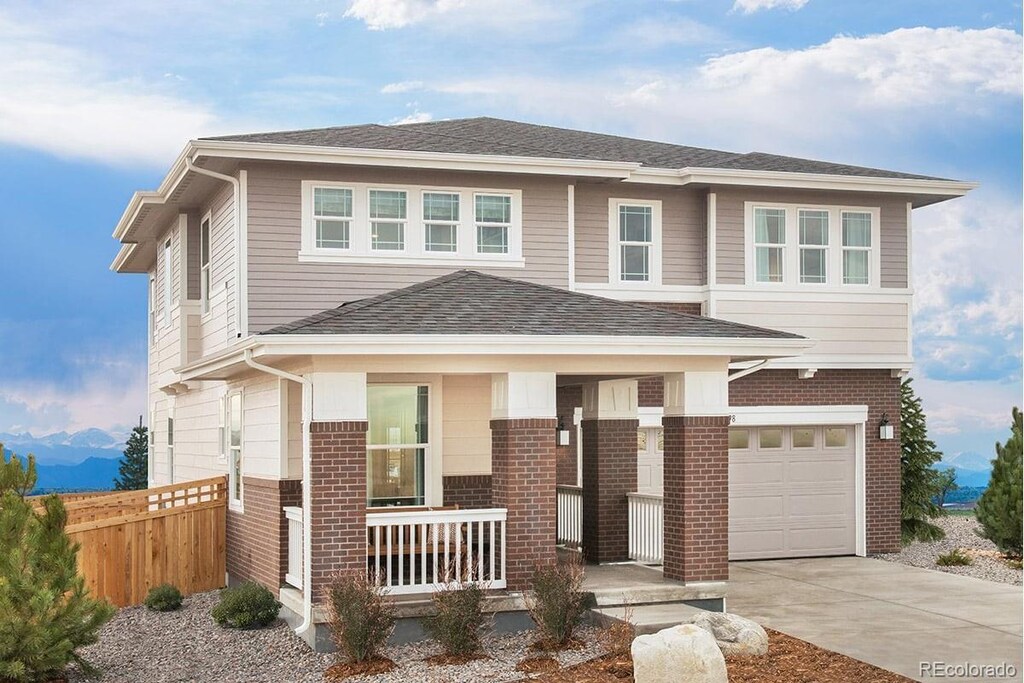 prairie-style house featuring a garage