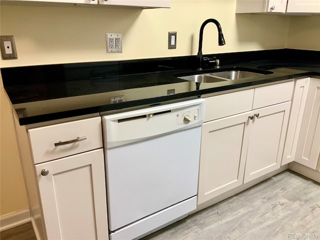 kitchen featuring white cabinetry, sink, light hardwood / wood-style flooring, and dishwasher