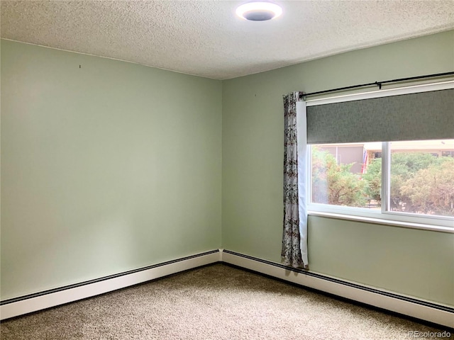 unfurnished room featuring carpet floors, a textured ceiling, and baseboard heating