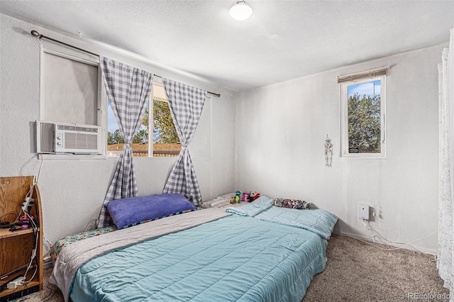 bedroom featuring carpet flooring and cooling unit