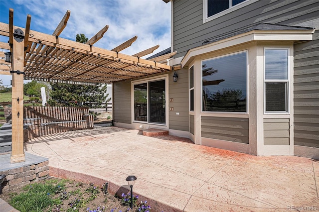 view of patio featuring a pergola