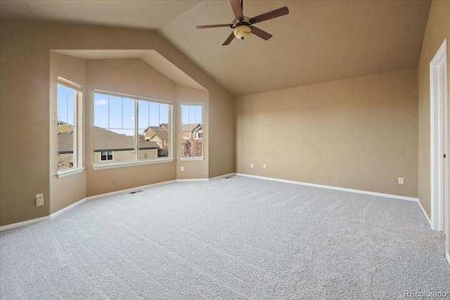 additional living space with carpet, lofted ceiling, and baseboards