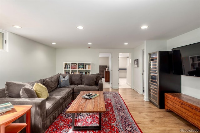 living room featuring light wood-style floors and recessed lighting