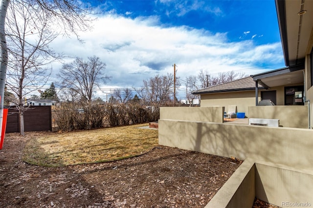 view of yard featuring fence