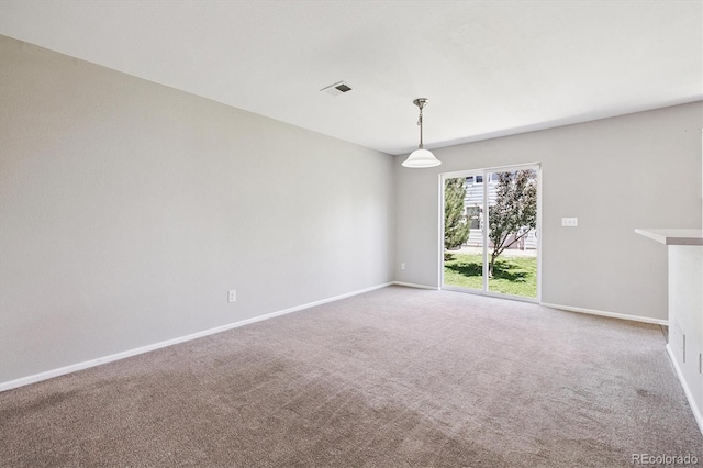 19209 E 58th Ave Unit C, Denver, CO 80249 - empty room featuring carpet flooring
