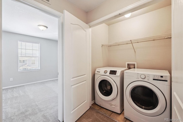 19209 E 58th Ave Unit C, Denver, CO 80249 - laundry area with separate washer and dryer and carpet flooring