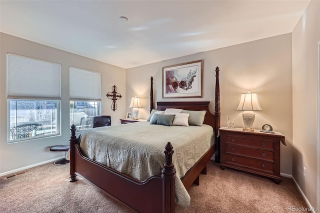 bedroom with light carpet