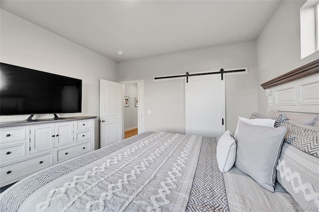 bedroom with a barn door