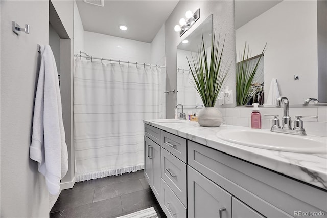 bathroom featuring vanity and tile patterned floors