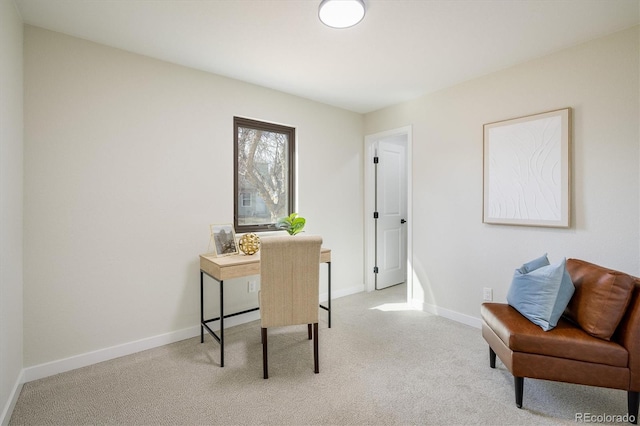 office space with baseboards and carpet