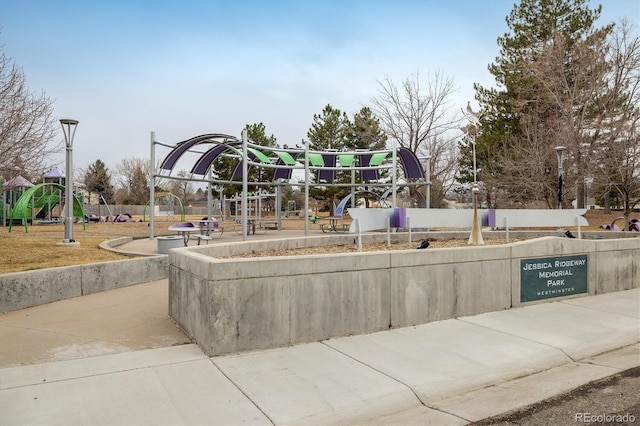 view of home's community featuring playground community
