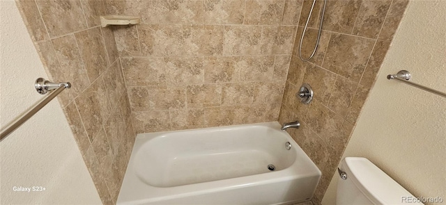 full bathroom with shower / bath combination and toilet