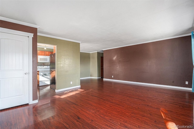 spare room with dark hardwood / wood-style floors and ornamental molding