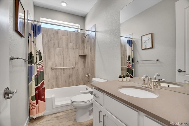 bathroom featuring vanity, shower / bath combination with curtain, toilet, and wood finished floors