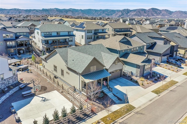 birds eye view of property featuring a residential view and a mountain view