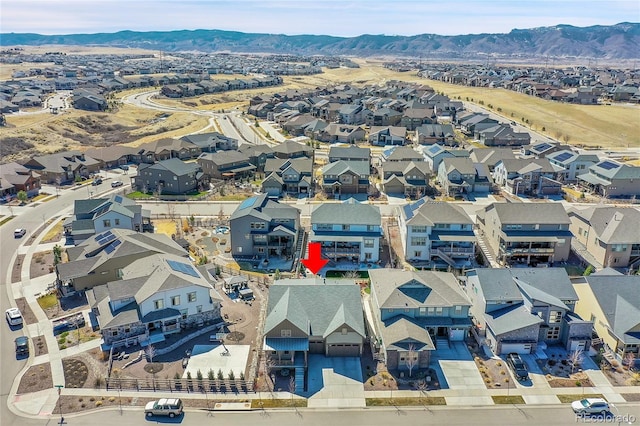 bird's eye view featuring a residential view and a mountain view