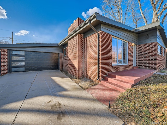 view of side of property featuring a garage