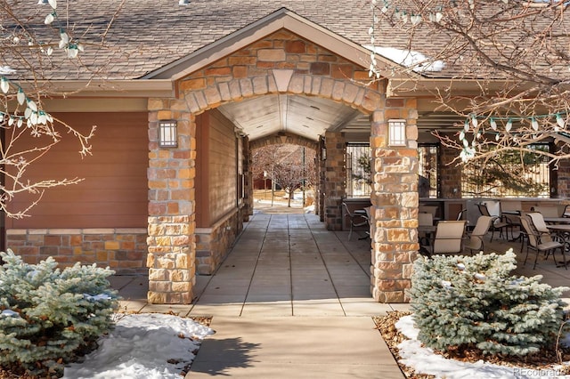 property entrance with a patio area