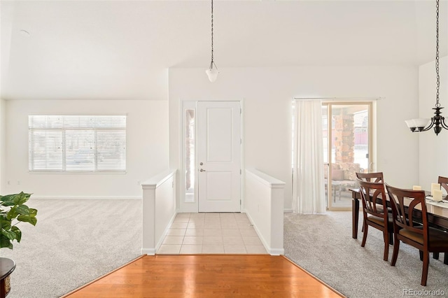 foyer entrance with light tile patterned floors