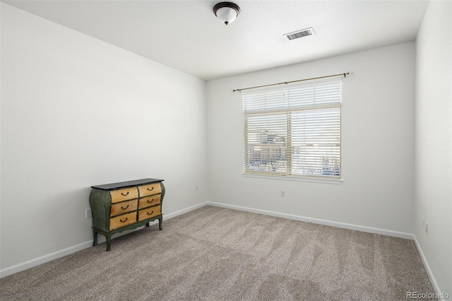 spare room with carpet flooring