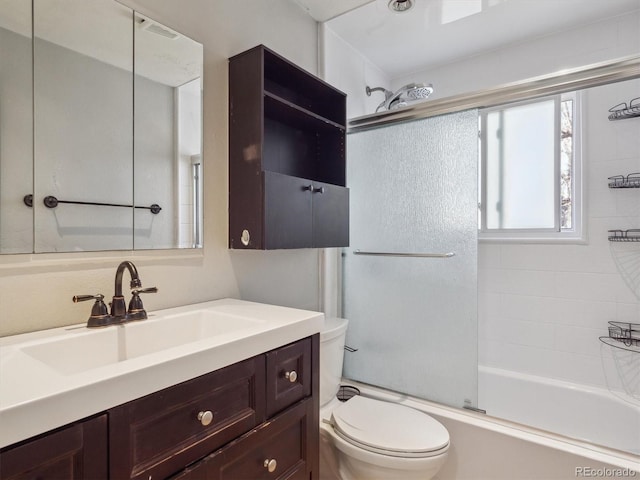 5945 W Morraine Ave, Littleton, CO 80128 - bathroom with toilet, combined bath / shower with glass door, and vanity
