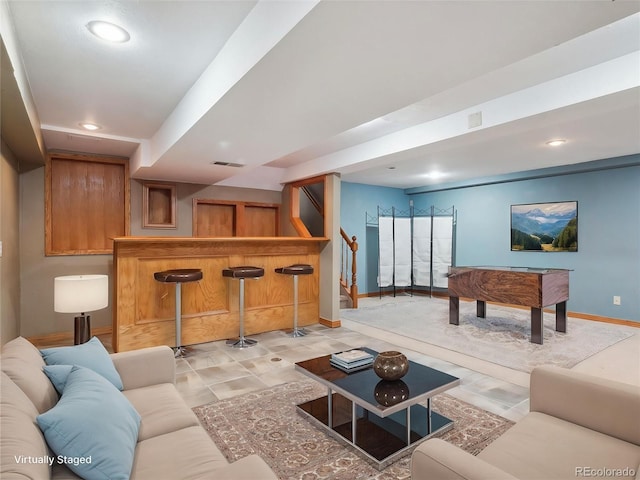 5945 W Morraine Ave, Littleton, CO 80128 - living area featuring baseboards, recessed lighting, stairway, a bar, and visible vents