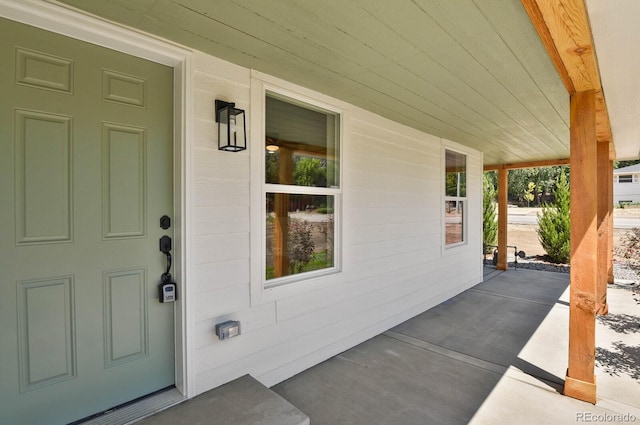 entrance to property with a porch