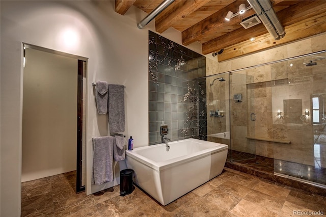 bathroom featuring beam ceiling, shower with separate bathtub, and wooden ceiling