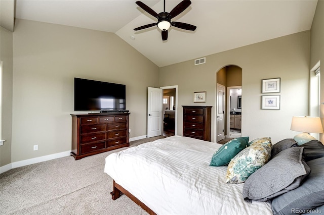 196 W 8th Ave, Byers, CO 80103 - bedroom with arched walkways, high vaulted ceiling, carpet, baseboards, and ensuite bathroom