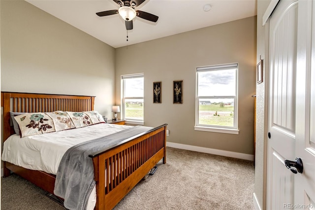 196 W 8th Ave, Byers, CO 80103 - carpeted bedroom with multiple windows, baseboards, and ceiling fan