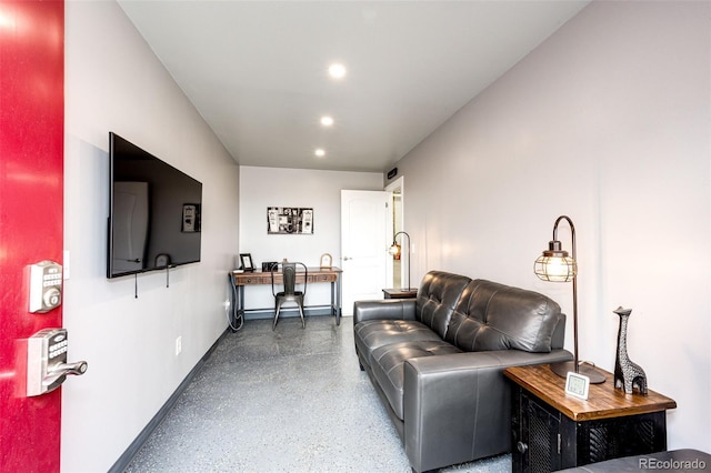 196 W 8th Ave, Byers, CO 80103 - living area with recessed lighting, baseboards, speckled floor, and a desk