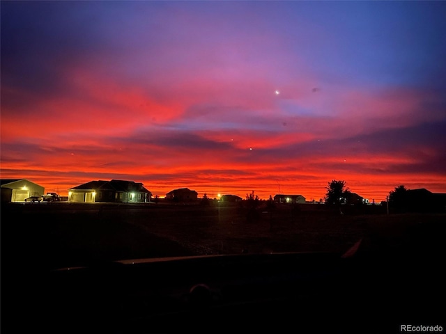 196 W 8th Ave, Byers, CO 80103 - view of yard at dusk