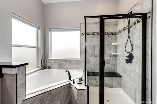 196 W 8th Ave, Byers, CO 80103 - full bathroom featuring a garden tub and a stall shower