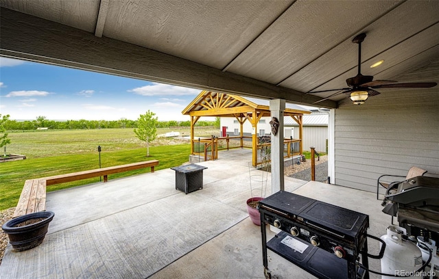196 W 8th Ave, Byers, CO 80103 - view of patio with ceiling fan