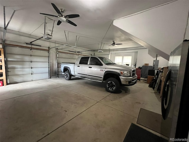 196 W 8th Ave, Byers, CO 80103 - garage with a garage door opener and a ceiling fan