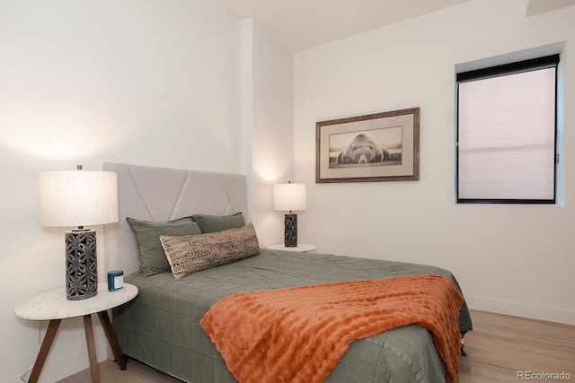 bedroom featuring light hardwood / wood-style flooring