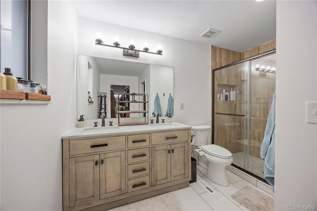 4028 S Atchison Way, Aurora, CO 80014 - bathroom featuring double vanity, a stall shower, and tile patterned floors