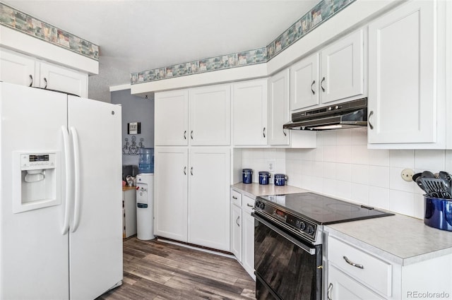 6735 E Lake Cir, Centennial, CO 80111 - kitchen with white cabinets, under cabinet range hood, light countertops, electric range oven, and white refrigerator with ice dispenser