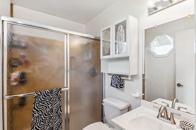 6735 E Lake Cir, Centennial, CO 80111 - full bath featuring toilet, a sink, and a stall shower